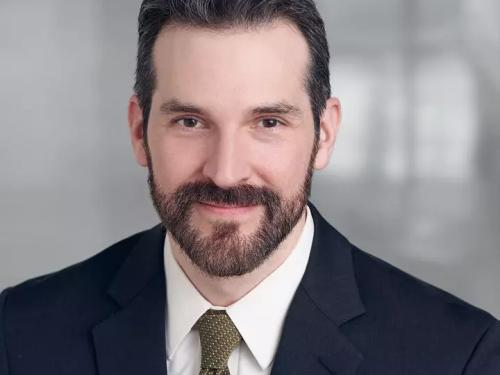 John Strickland, Esq.