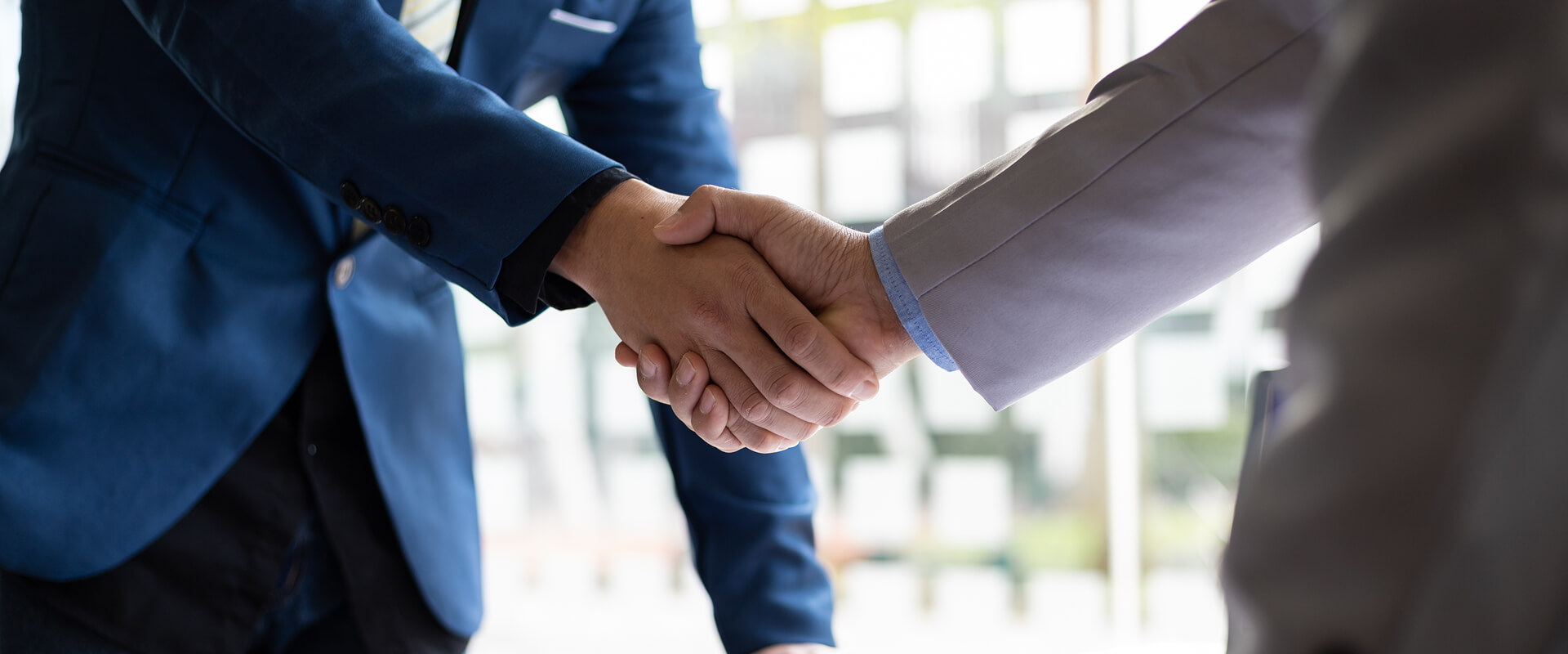 men shaking hands 
